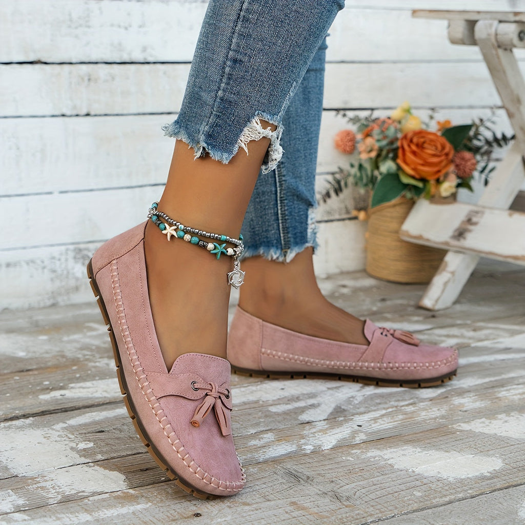 Women's moc toe loafers with decorative tassels