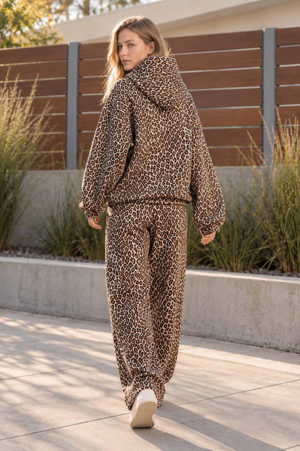 Women's leopard print hooded sweatshirt and matching full-length trousers set