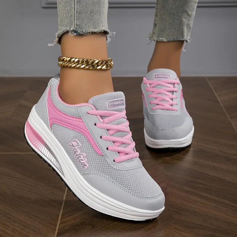 Women's low-top lace-up sneaker with printed symbols, round toe and white sole
