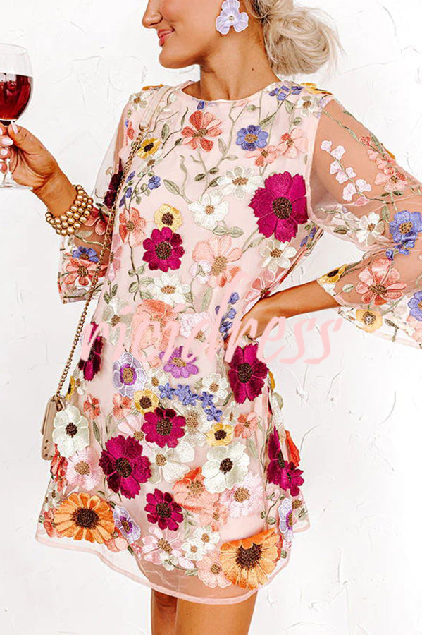 Women's pink floral mini dress with round neckline and 3/4 sleeves