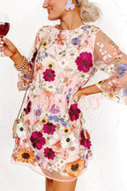 Women's pink floral mini dress with round neckline and 3/4 sleeves