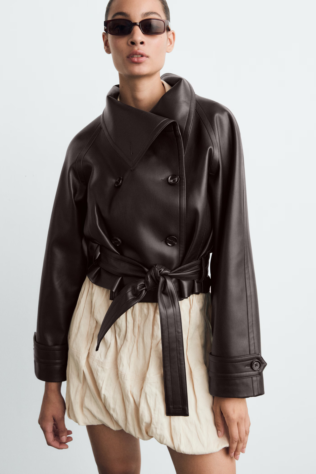 Women's cropped wrap jacket with long sleeves, wide collar and tie belt