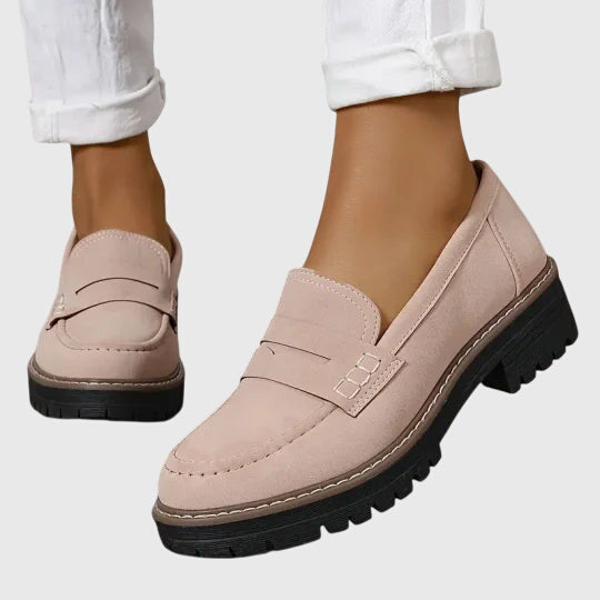 Women's penny loafers with round toes and low lug soles