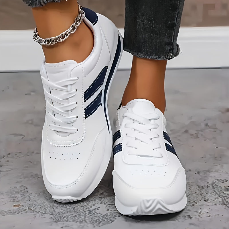 Women's white lace-up sneakers with dark side stripes