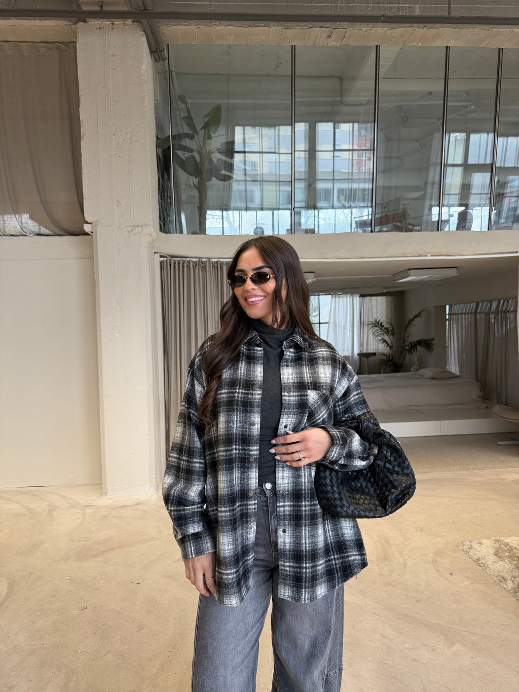 Women's black checked roll neck jumper