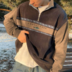 Men's geometric half-zip mock neck sweater with contrasting panels