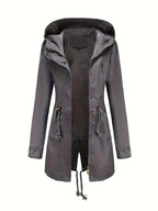 Women's long hooded parka jacket with drawstring waist, long sleeves and front zip