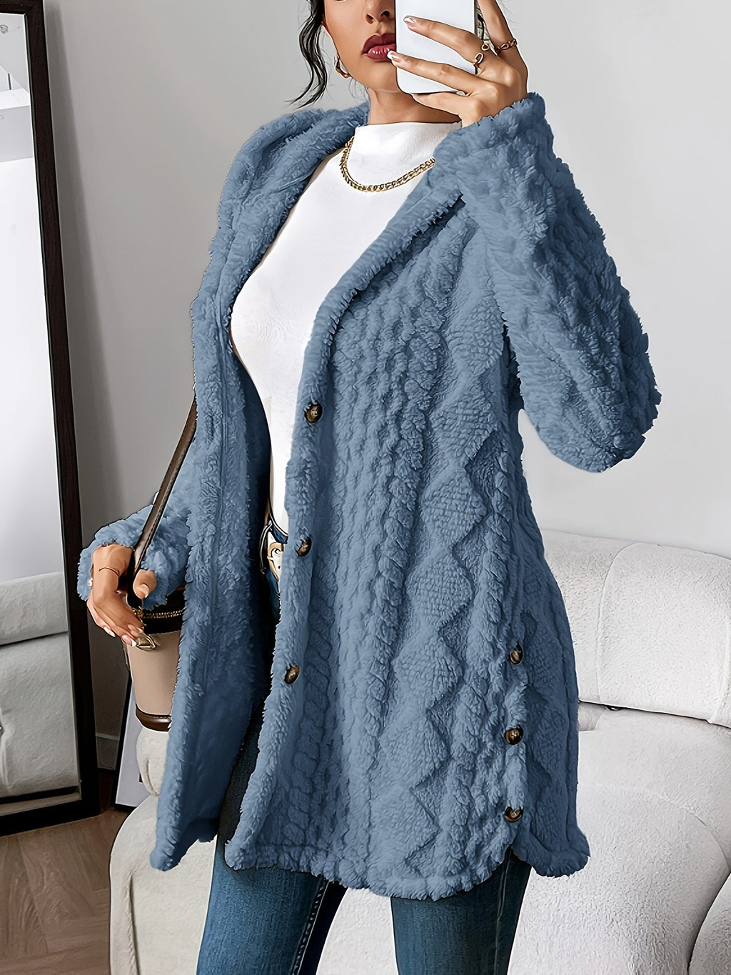 Women's hooded textured cardigan with long sleeves and button front