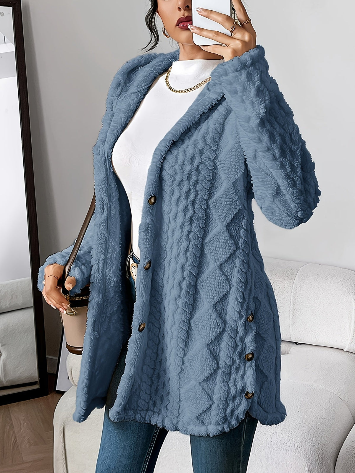 Women's hooded textured cardigan with long sleeves and button front