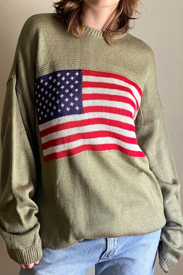 Women's knit sweater with high neck and stars and stripes flag motif
