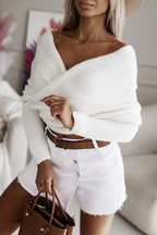 Women's off-shoulder knit poncho sweater with long sleeves