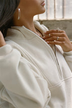 Women's oversized half-zip longline sweatshirt with stand collar