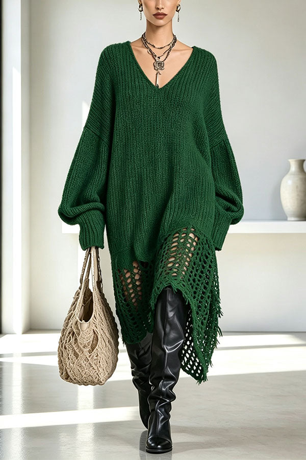 Women's ribbed knit V-neck dress with long sleeves and asymmetrical openwork hem