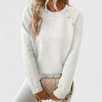 Women's long-sleeve crew neck jumper with shoulder buttons and cropped hem