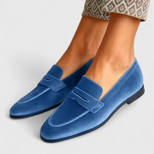 Blue square-toe penny loafers with strap detail and low heels
