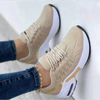 Women's lace-up sneakers with panelled uppers and platform soles
