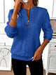 Women's cable knit half-zip sweater with long sleeves