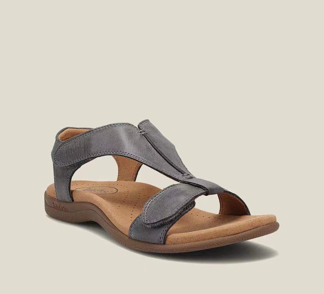 Women's black orthopedic t-strap sandal with adjustable velcro and contoured footbed
