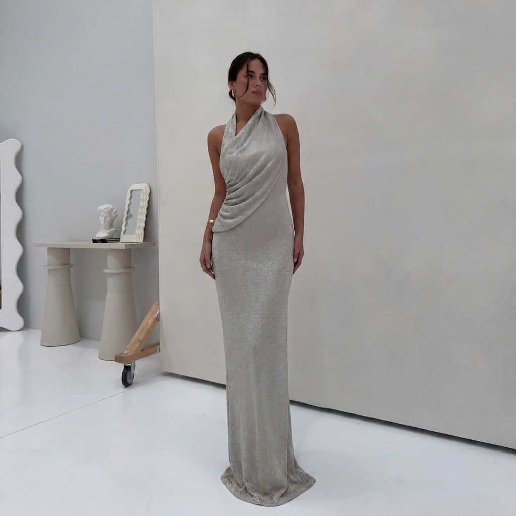 Women's silver halter maxi dress with wrap front and shimmer finish