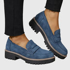 Women's penny loafers with round toes and low lug soles
