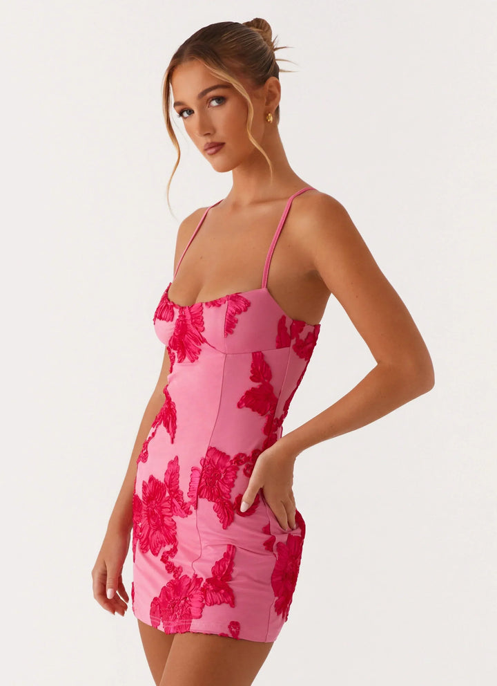 Women's pink floral mini dress with sweetheart neckline and spaghetti straps