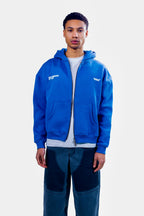 Men's blue zip-up hoodie with white chest text and front pouch pockets