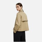 Women's short belted trench jacket with high collar and button front