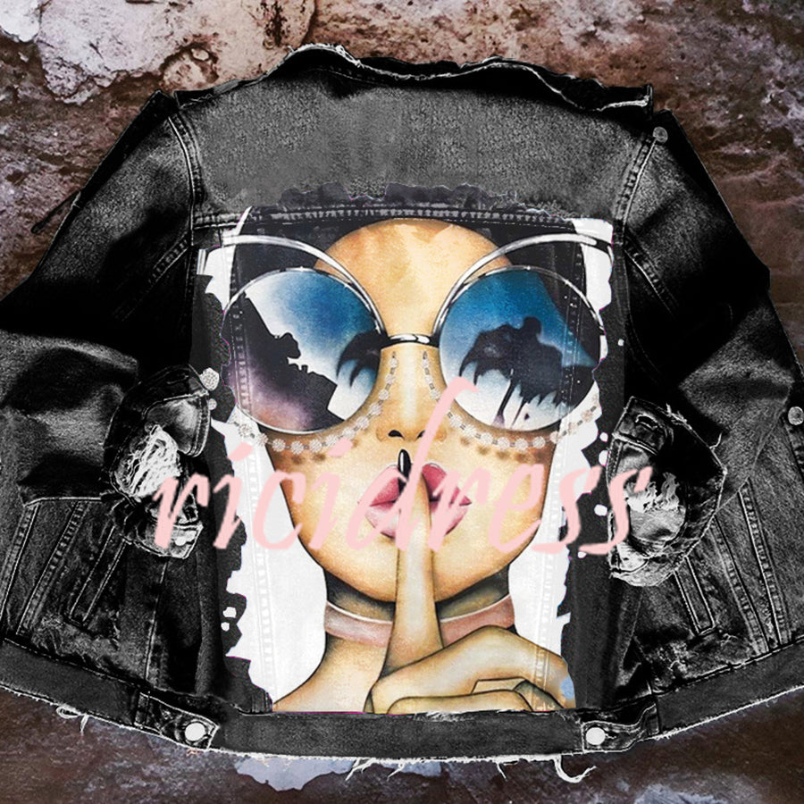 Women's printed denim jacket with portrait graphic and distressed details