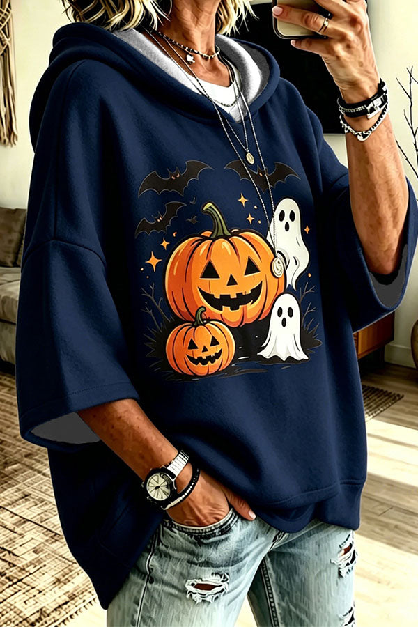Women's oversized hooded top with pumpkin, bat and ghost Halloween graphic