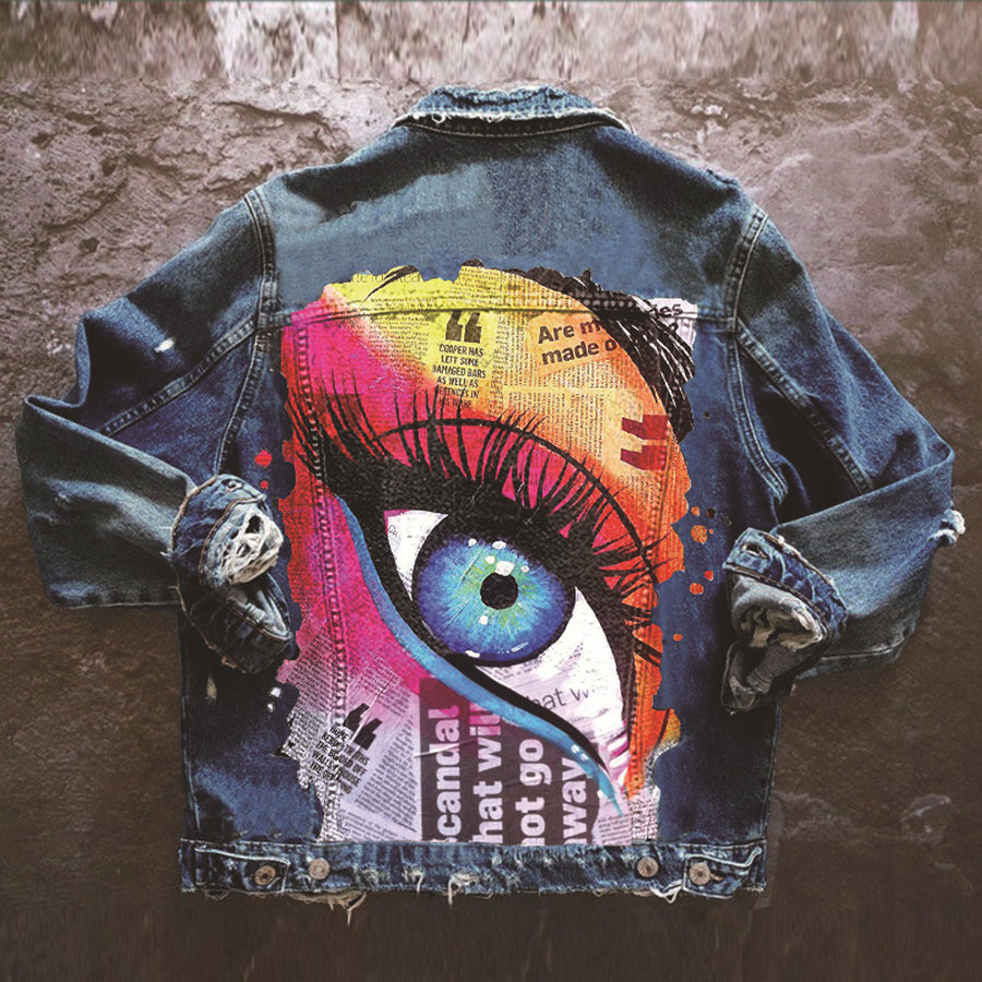 Women's denim jacket with colourful graphic eye print on the back