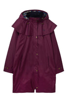 Women's hooded long raincoat with cape overlay and button front