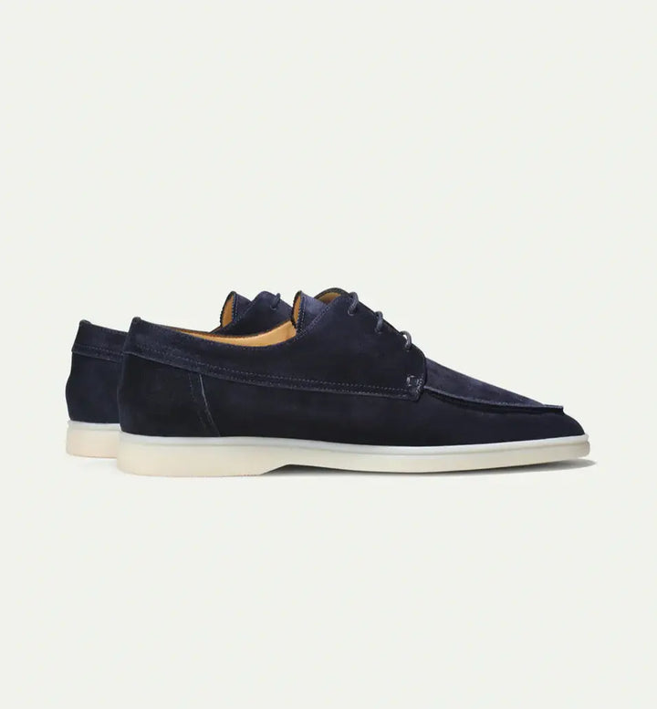 Men's lace-up moccasin shoes shown in black and beige with round toes and flat soles