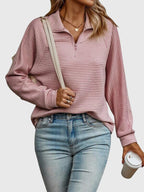 Women's ribbed quarter-zip sweater with collar and long sleeves