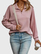 Women's ribbed quarter-zip sweater with collar and long sleeves