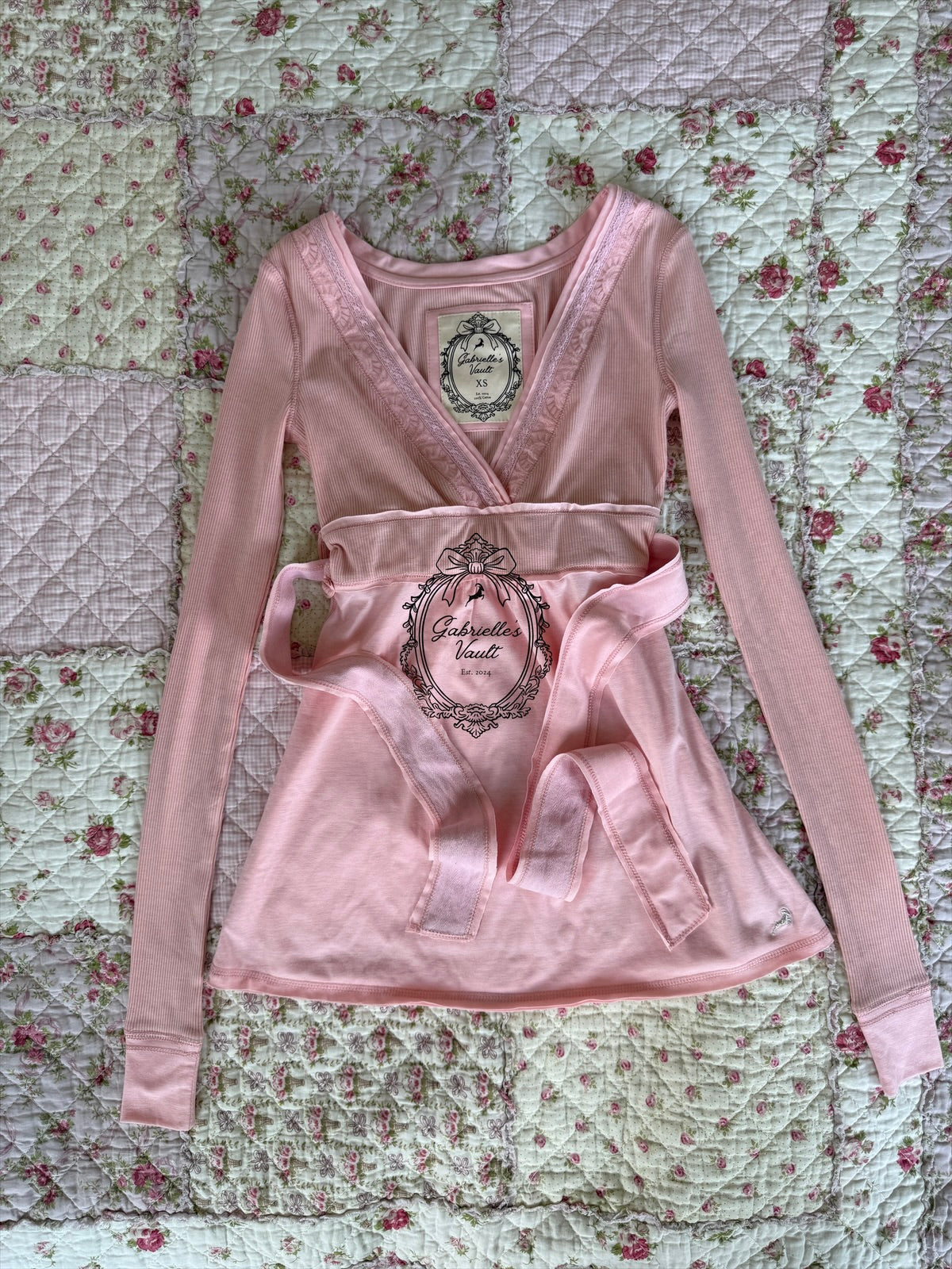 Women's wrap babydoll top with long sleeves and waist ties