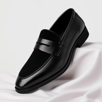Men's navy and black penny loafers with almond toe and low heel