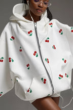 Women's oversized zip hoodie with repeated cherry print, hood and front pocket