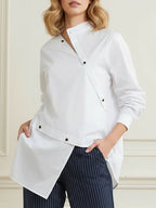 Women's white asymmetric button front blouse with long sleeves