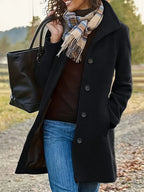 Women's textured mid-length coat with lapel collar and button front