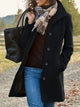 Women's textured mid-length coat with lapel collar and button front