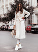 Women's long open-front coat with lapel collar and side pockets