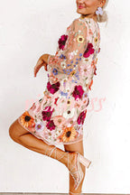 Women's pink floral mini dress with round neckline and 3/4 sleeves