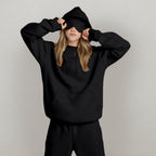 Women's hooded sweatshirt and jogger set with long sleeves and front pocket