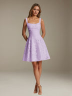 Women's sleeveless floral A-line mini dress with a square neckline
