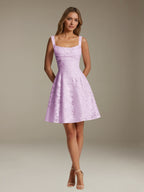 Women's sleeveless floral A-line mini dress with a square neckline