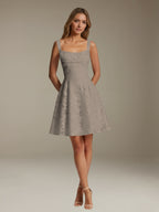 Women's sleeveless floral A-line mini dress with a square neckline