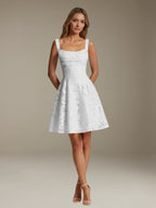 Women's sleeveless floral A-line mini dress with a square neckline