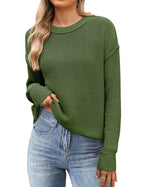 Women's black cropped knit sweater with crew neck and long sleeves