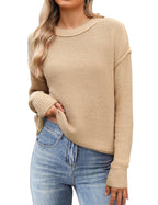 Women's black cropped knit sweater with crew neck and long sleeves