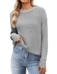 Women's black cropped knit sweater with crew neck and long sleeves